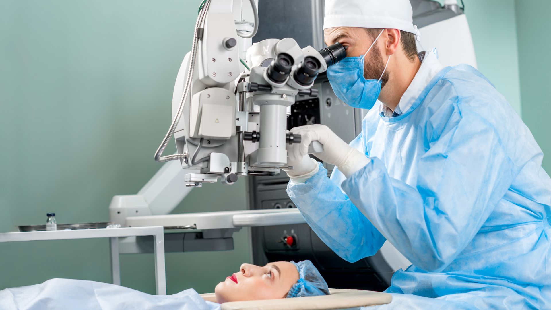 A detailed surgical scene depicting various cataract treatment options. In the foreground, a close-up view of an eye with a cataract-affected lens. In the middle ground, a series of intraocular lenses of different types - monofocal, multifocal, and toric lenses - displayed on a sterile surgical tray. The background shows the interior of an ophthalmology clinic, with modern medical equipment, bright surgical lighting, and a sense of clinical precision. The overall mood is informative and educational, inviting the viewer to learn about the different cataract surgery choices available. Cataract Symptoms 05